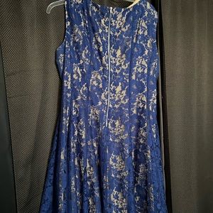 Blue lace over nude dress.  SZ 18 gently worn.  Beautiful flare in skirt.